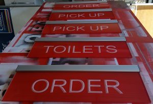 Edge-lit sign manufacture